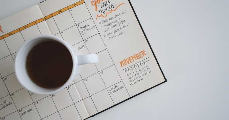 Planner calendar and laptop for Class of 2030 first-semester college course registration planning