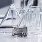 Science laboratory glassware representing the now-optional ACT Science section