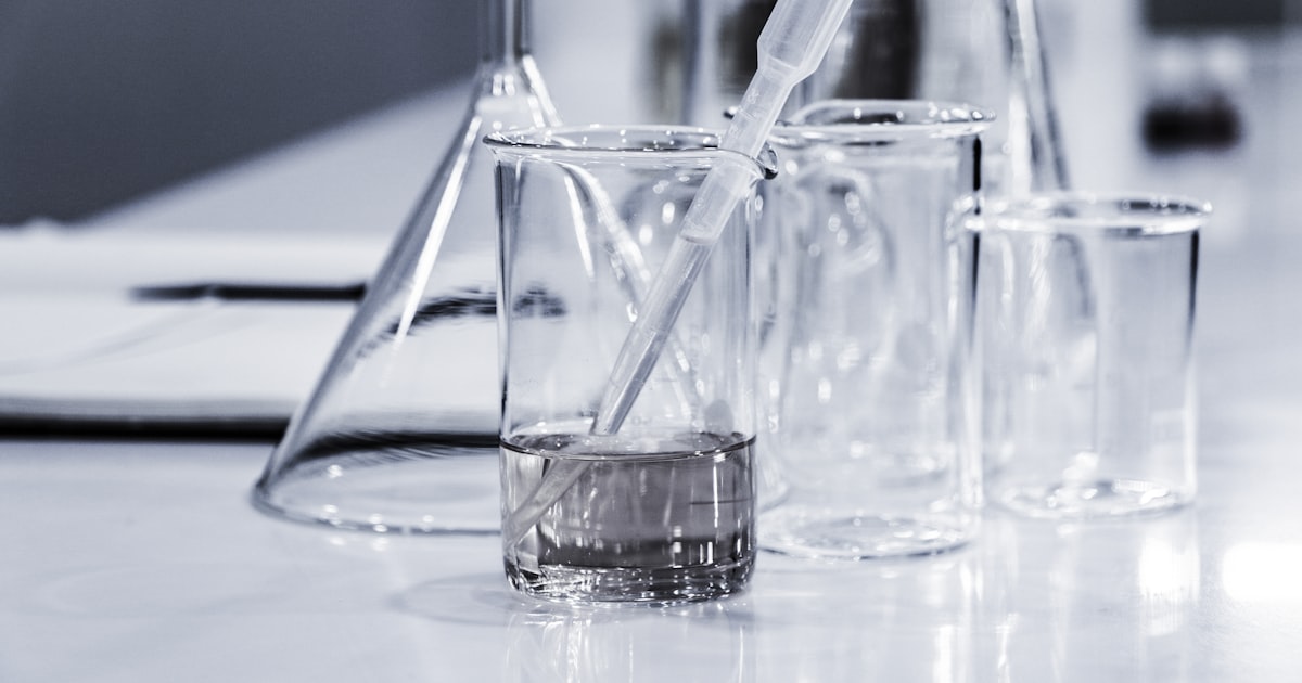 Science laboratory glassware representing the now-optional ACT Science section