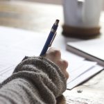 Student comparing TOEFL, IELTS and Duolingo English Test options while planning university application deadlines