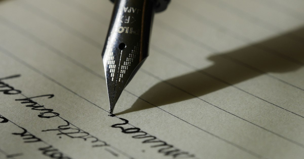 A close-up of a vintage typewriter with a sheet of paper, symbolizing the mechanics of grammar and sentence construction